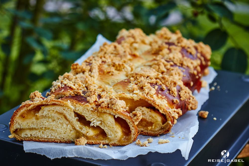 Plaited yeast loaf with rhubarb and oatmeal crumble